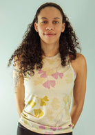 Women's sleeveless bike jersey with floral design and breathable mesh fabric.