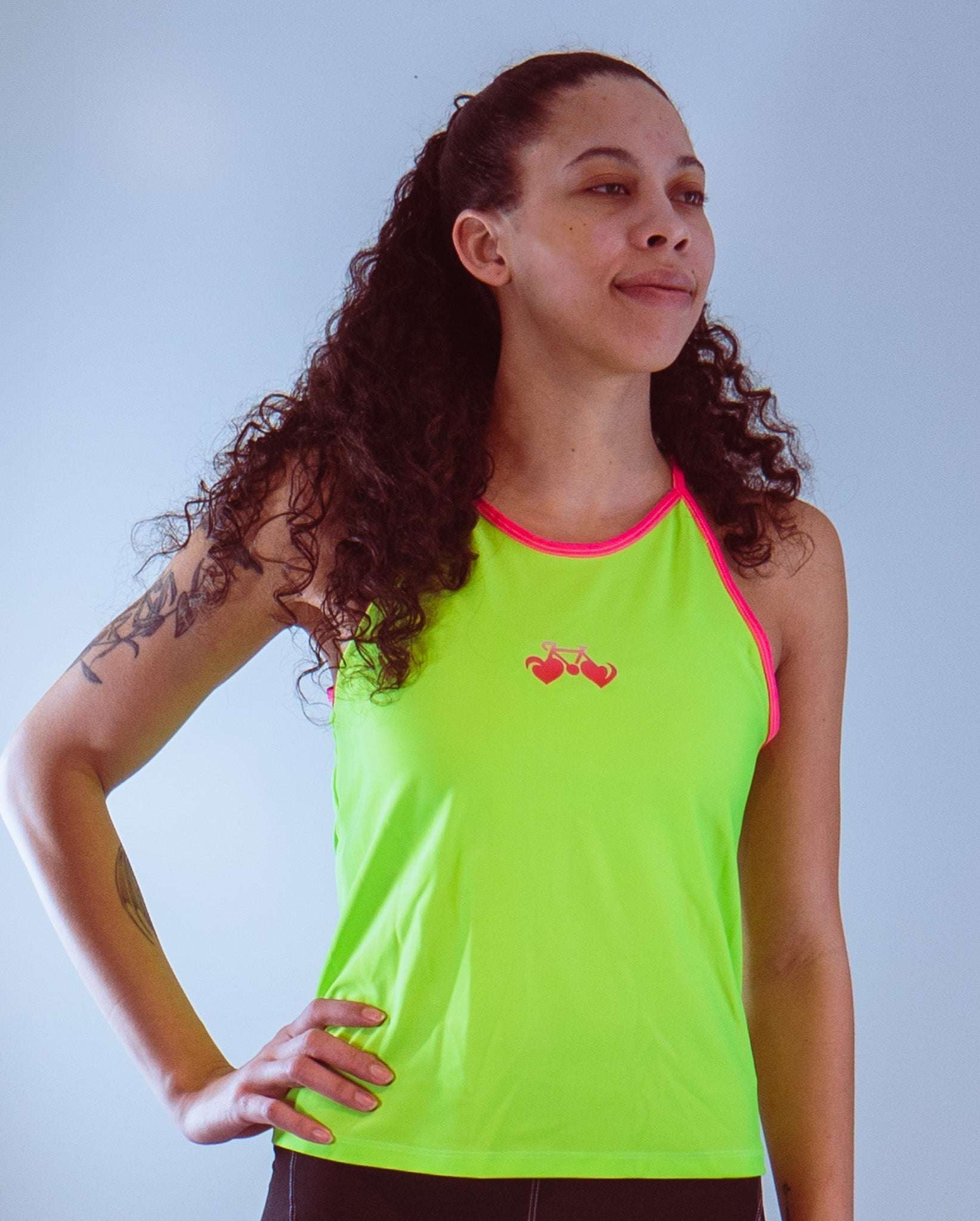 Women's sleeveless high-vis cycling jersey with Bike Luv graphic.