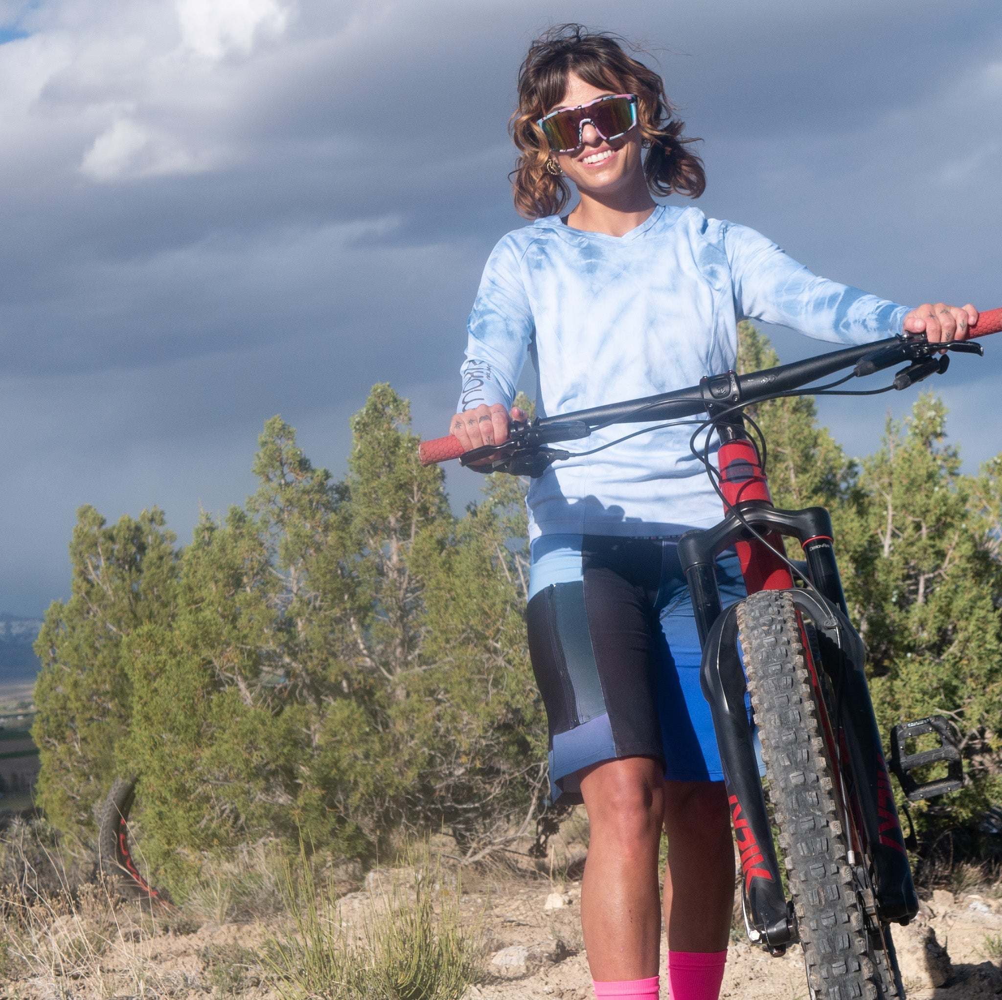 Steezy Stretch Bike Shorts Blues on mountain biker outdoors.