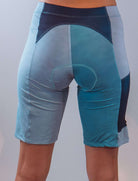 Women's mountain bike shorts with Italian chamois in blue, designed for gravel riding and comfort.
