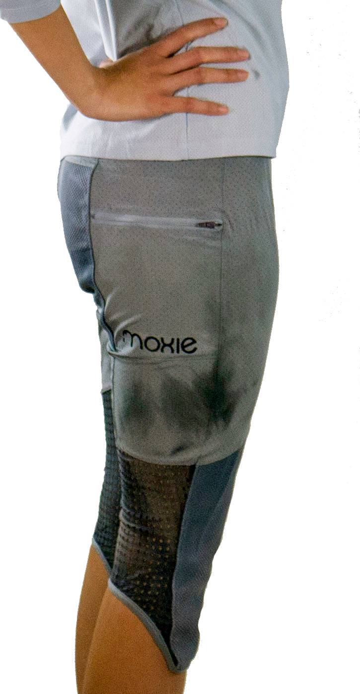 Bike pants with black and white stripes, featuring removable G-Form knee pads.