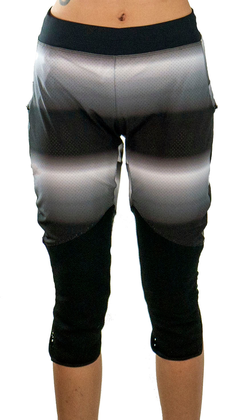 Women's mountain bike pants with removable G-Form hip and knee pads in black and gray gradient design