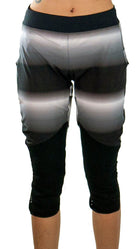 Bike pants with removable G-Form knee pads in black and gray gradient, designed for durable, breathable all-year-round mountain biking.