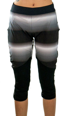 Bike pants with removable G-Form knee pads in black and gray gradient, designed for durable, breathable all-year-round mountain biking.