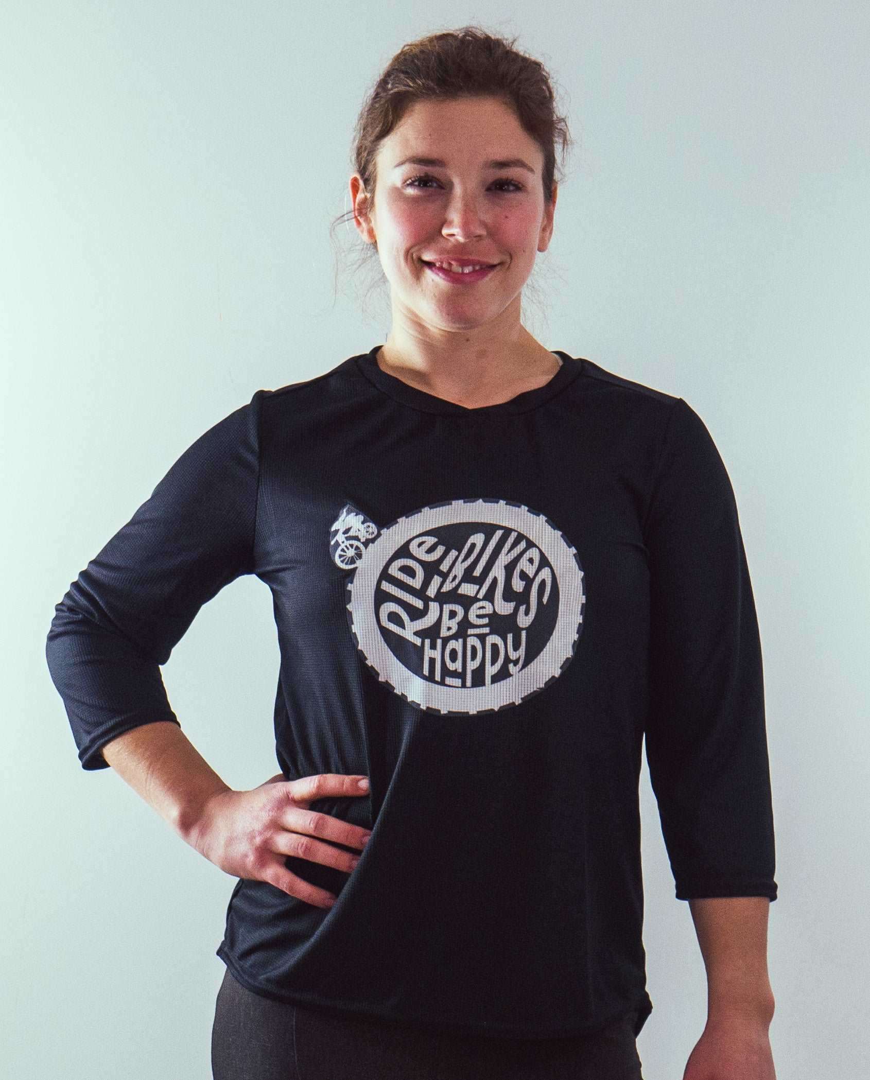 Happy Mountain Bike Jersey with three-quarter sleeves and breathable mesh fabric, featuring "Ride Bikes Be Happy" design.