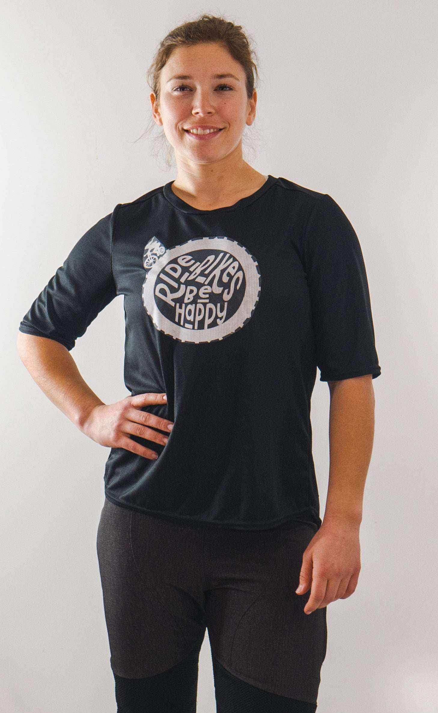 Lightweight 'Ride Bikes Be Happy' short sleeve with breathable mesh fabric and looser mountain bike fit.