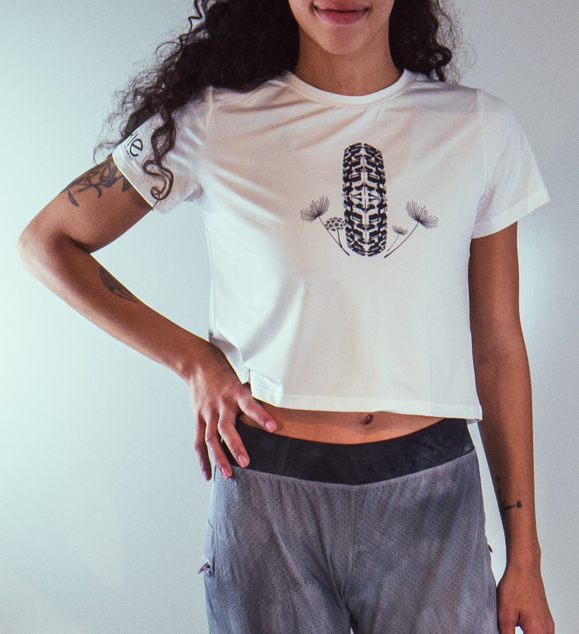 Moxie crop top white with mtb tire graphic