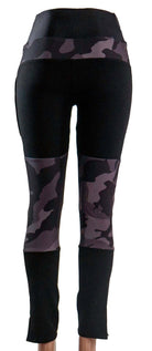 Mountain bike pants in black camo for women with durable fabric and removable knee pads.