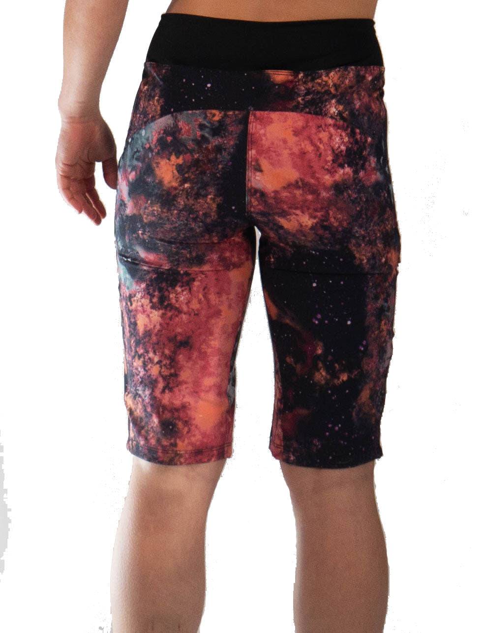 Women's Mountain Short - Fire with elastic yoga waist and versatile pockets, featuring stretch poly spandex and moisture-wicking fabric.