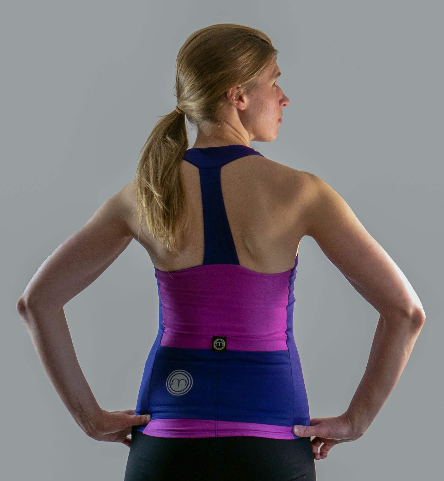 High visibility purple cycling top with T-back design and ventilation ports.