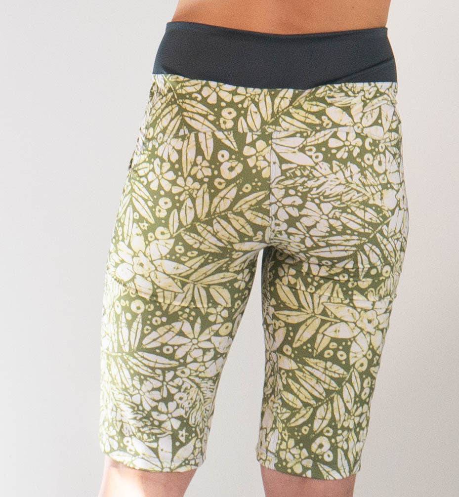 Women's Mountain Short-Peace Leaf with green leaf pattern, contoured elastic waistband, and purple stitching.