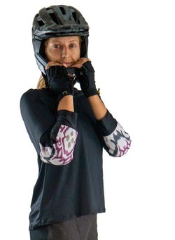 Mountain bike jersey with stylish elbow pockets for G-Form pads, featuring durable stretch fabric and vibrant prints.