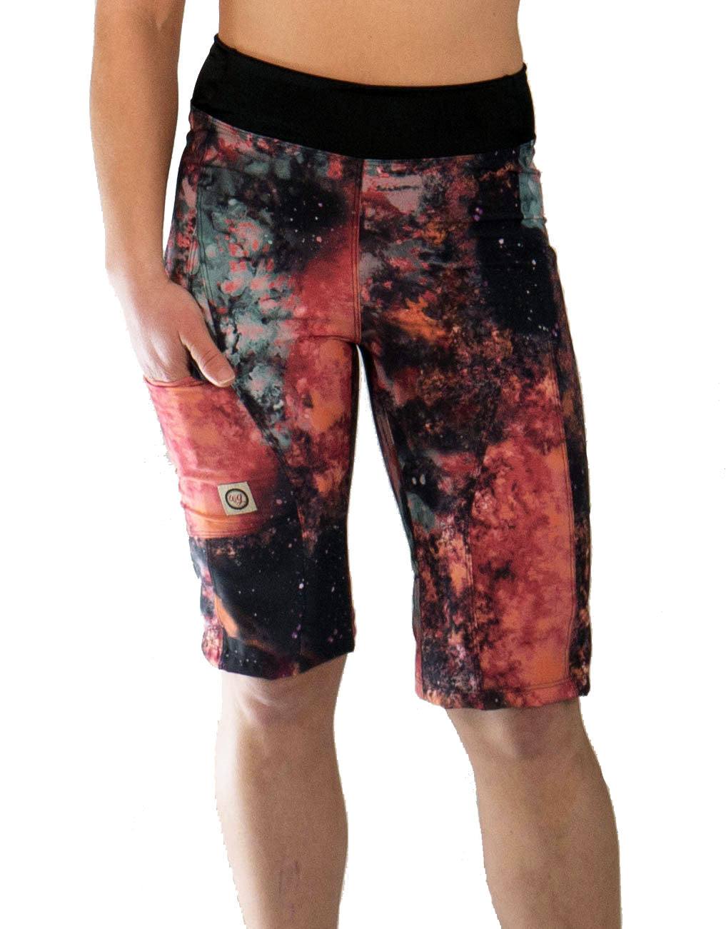 Women's mountain bike shorts with fiery pattern and curved fit.