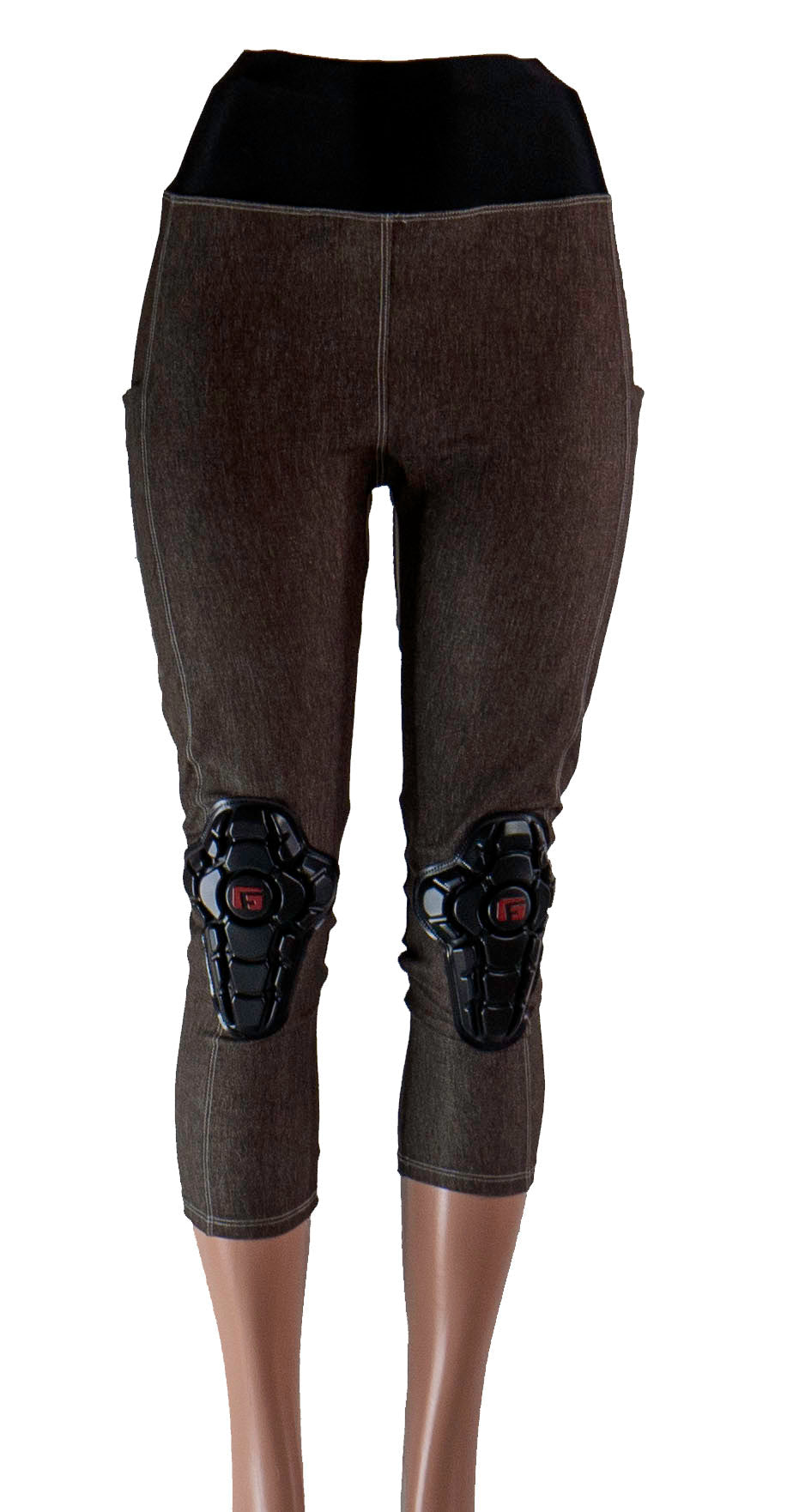 Women's bike pants in mixed denim, featuring knee padding for cycling.