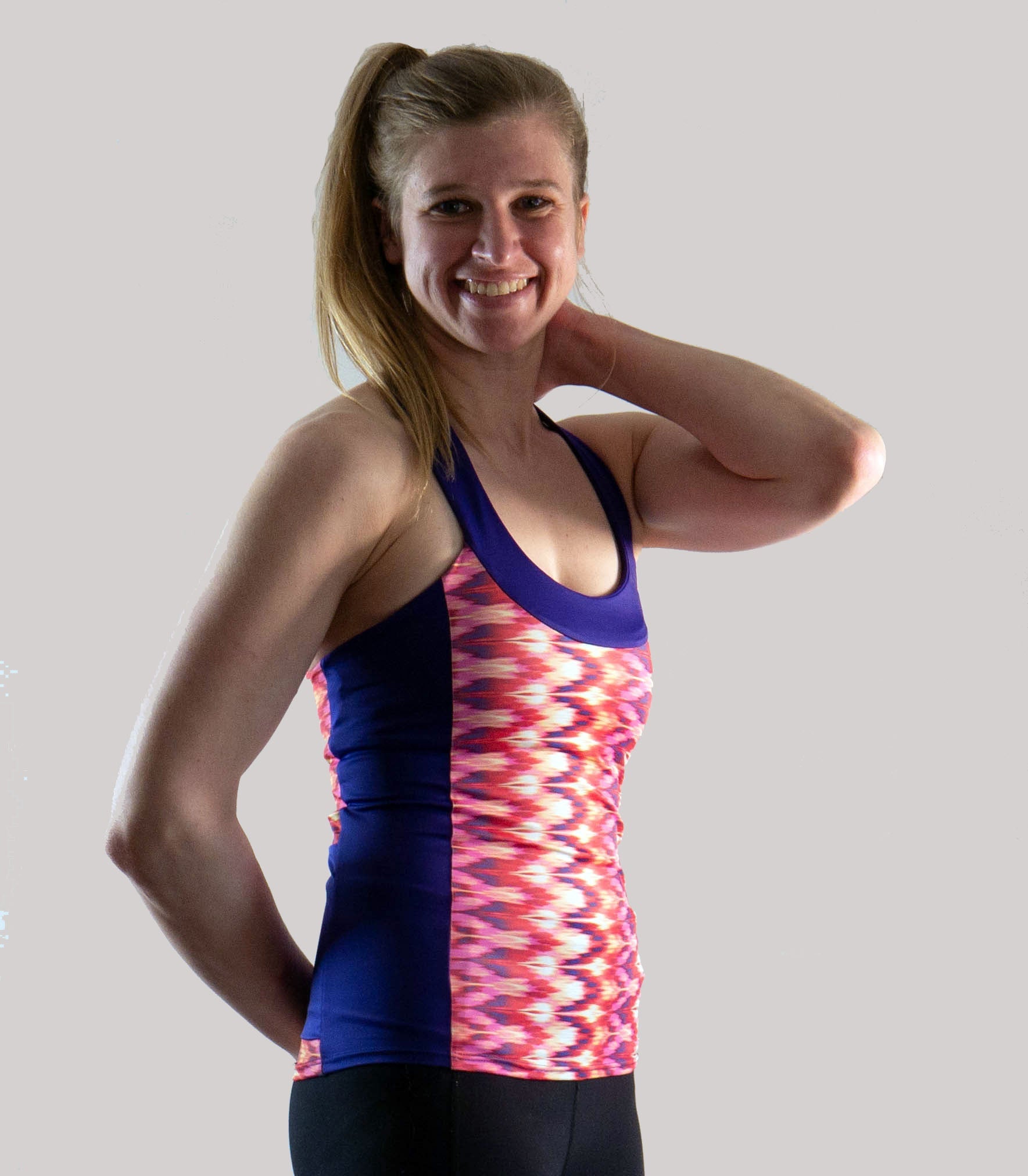 Moxie T-Back Jersey Mod with vibrant print and moisture-wicking fabric.