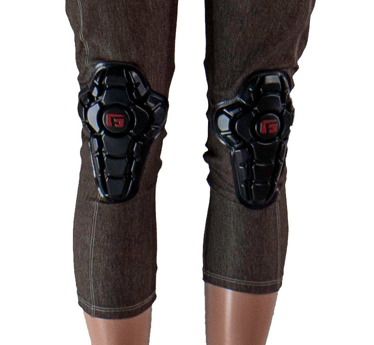 Women's bike pants in mixed denim with knee protection.