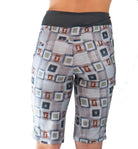 Women's mountain bike shorts in Hopscotch Plaid pattern with flattering fit and stretchy waistband.