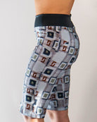 Women's mountain bike short with hopscotch plaid pattern and contoured elastic waistband.