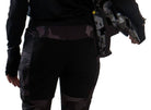 Women's technical mountain bike pants with integrated G-Form pads — back view